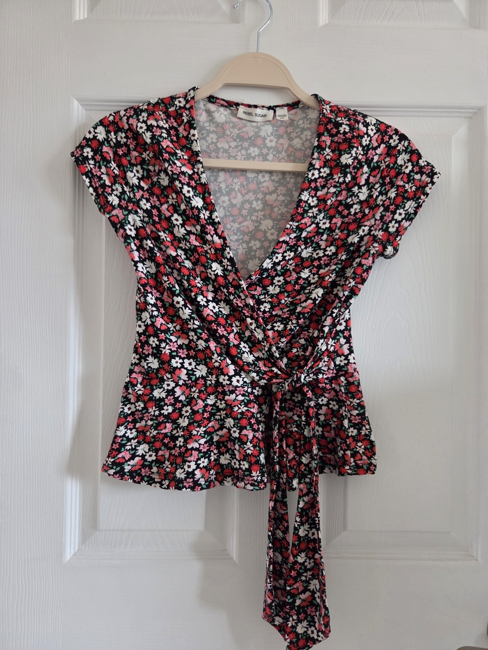 Rebel Sugar Black Floral Wrap Top with Pink and White Blossoms